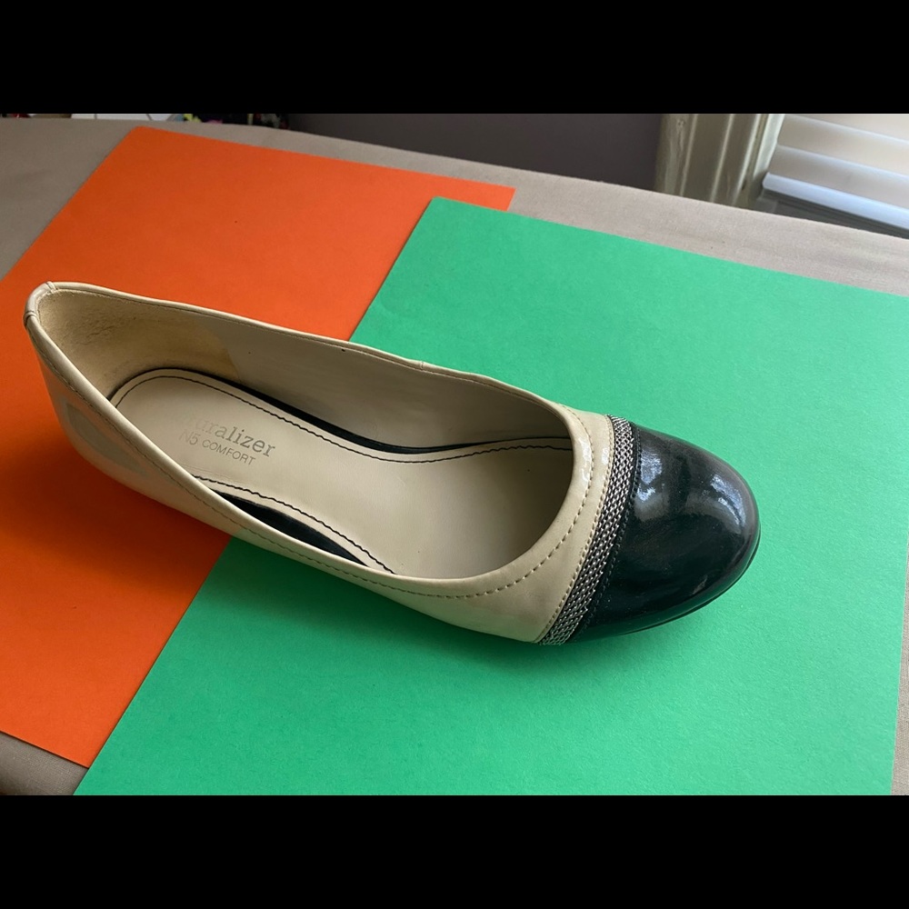 Nude and Black flats